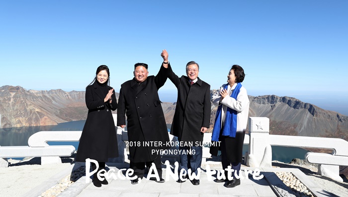 Holding hands high atop Baekdusan Mountain